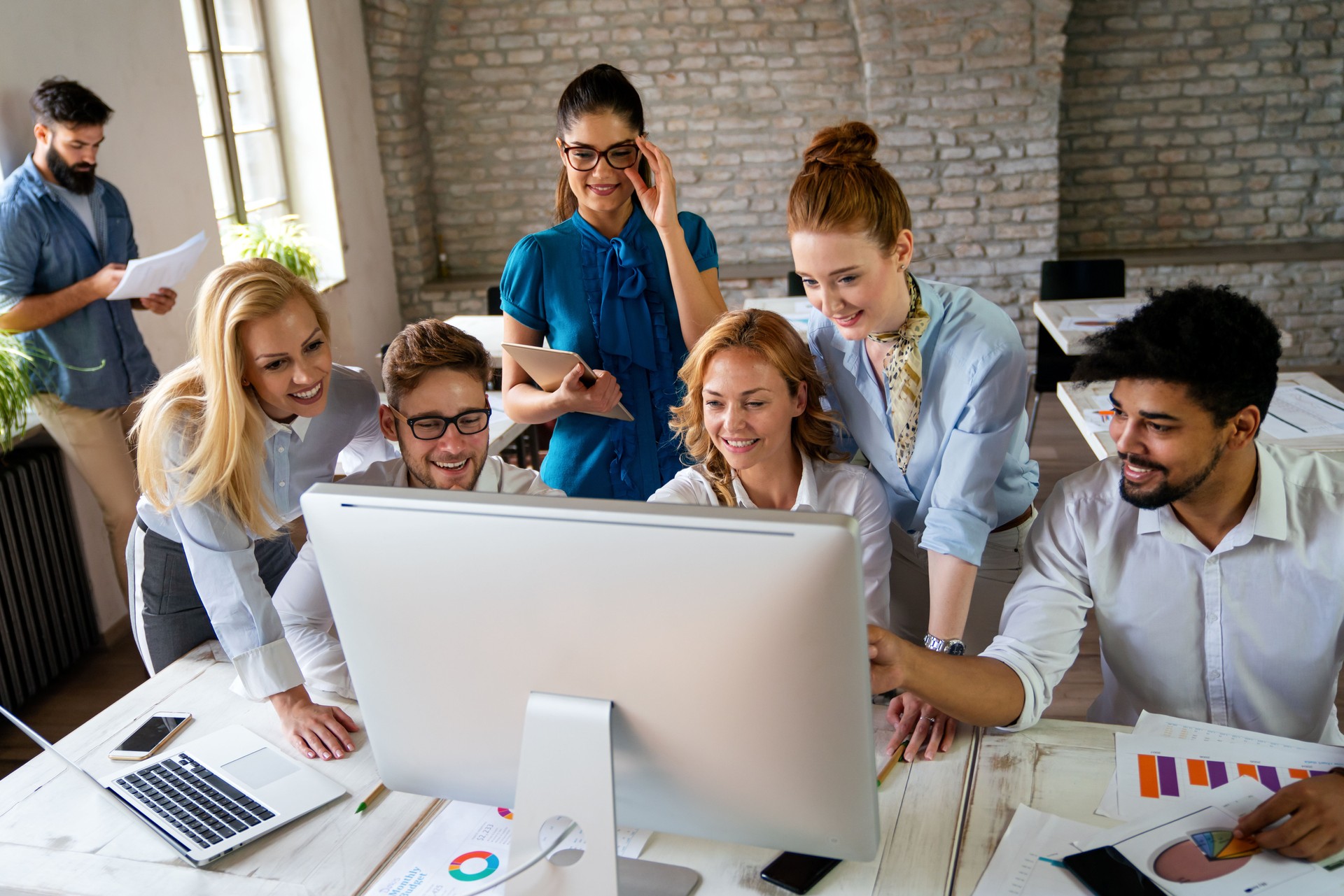 Programmers working in a software developing company office. Business people as a team
